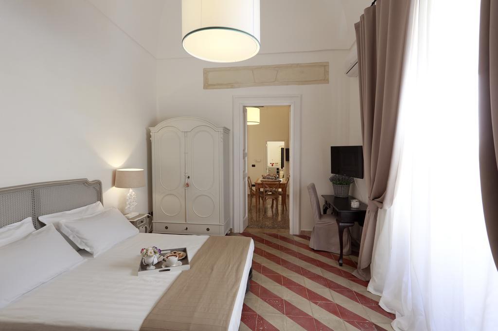 Santa Marta Suites & Apartments Лечче Номер фото
